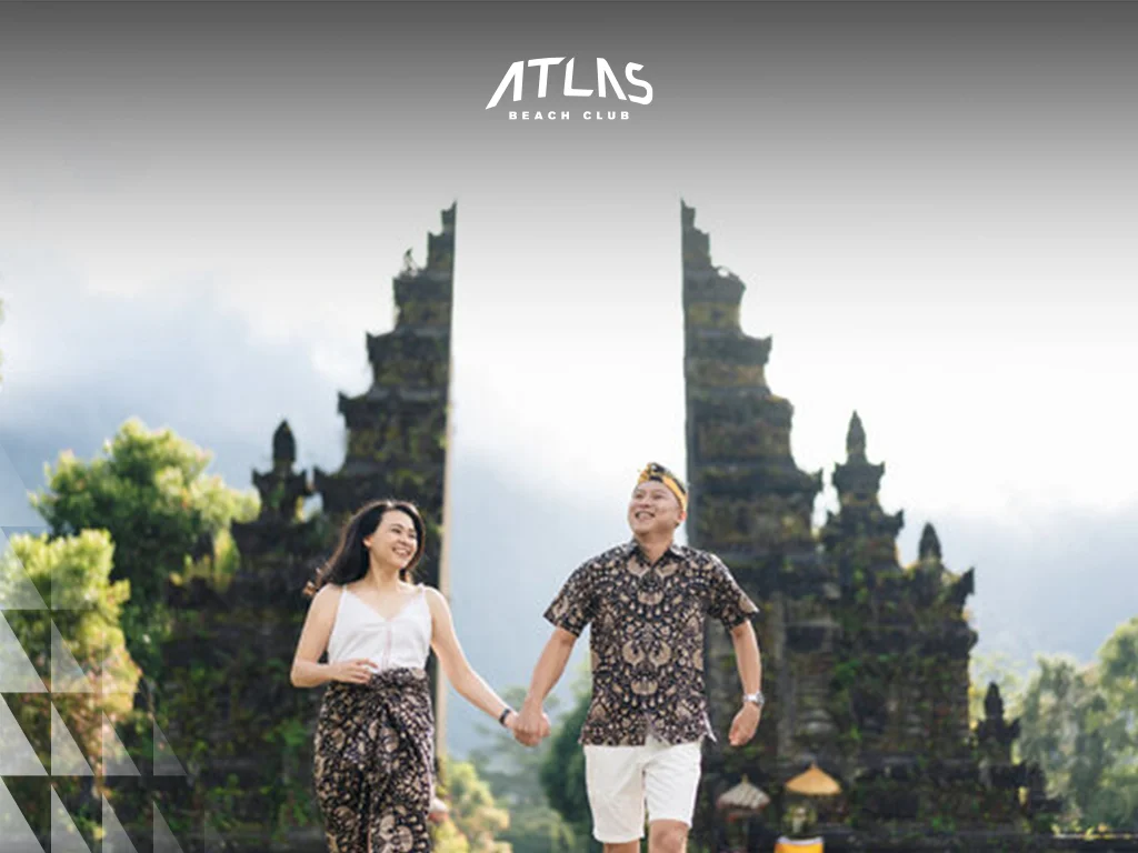 Find Bali’s top photographers for family shoots, offering expertise and collaborations with venues like Atlas Beach Club. Professional family photographer in Bali, Photographer capturing candid moments at the beach, Family posing with a scenic backdrop