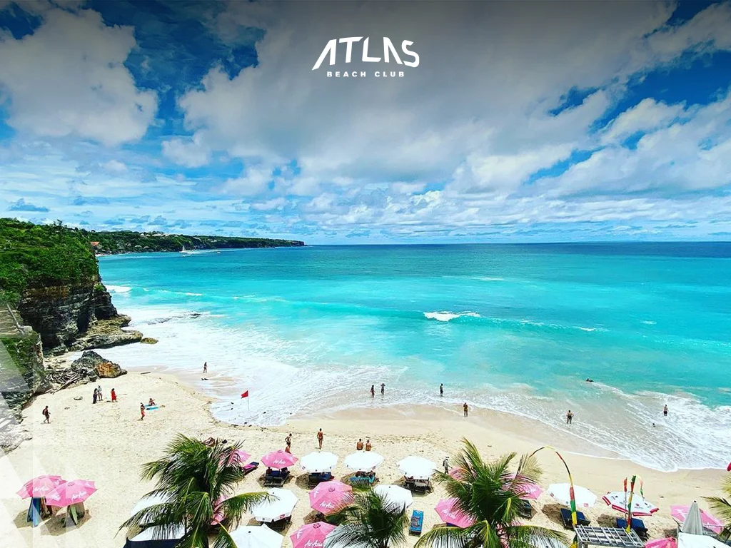 Compare serene Mediterranean beaches and Bali’s adventurous coastlines, including Atlas Beach Club’s offerings. Santorini tranquility, Nusa Dua relaxation, Atlas Beach Club adventure.
