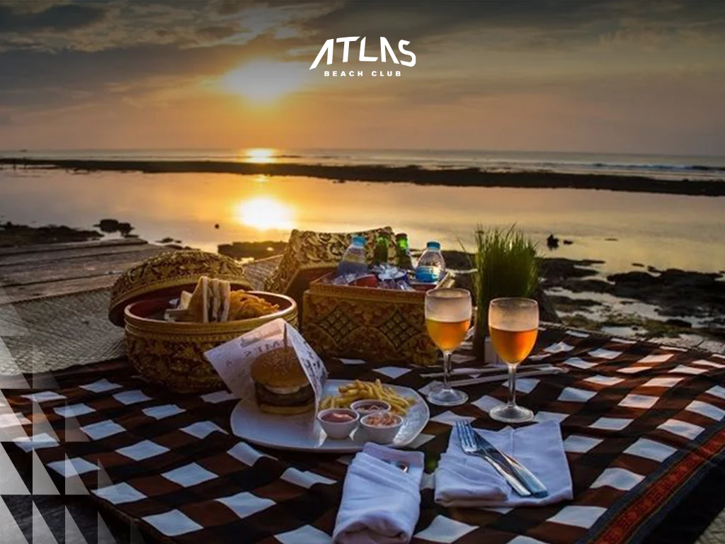 Dining at Jimbaran’s seafood cafes, stylish Seminyak restaurants, Atlas Beach Club luxury meals.