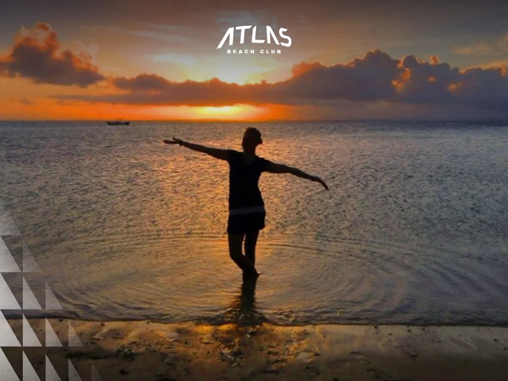  Kuta Beach sunset skies, serene Jimbaran coastline, tourists enjoying Seminyak sunsets.