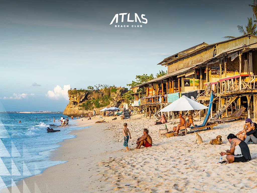 Bali’s beaches and parks are perfect for family picnics, featuring shaded areas and stunning views. Nusa Dua beach picnic, family in a park, scenic coastal views